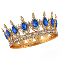 Корона золото с синими камнями